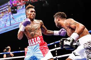 Charlo defeating Trout.