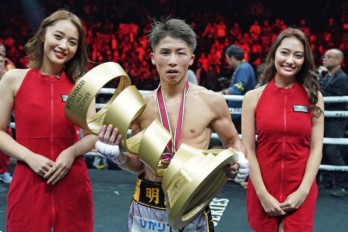 Naoya Inoue with the trophy he would loan to Nonito Donaire