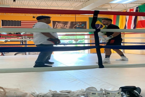 Under the watchful eye of Buddy McGirt, Cem Kilic moves up