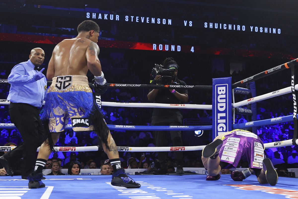 Shakur Stevenson rolls on photo by Mikey Williams Top Rank