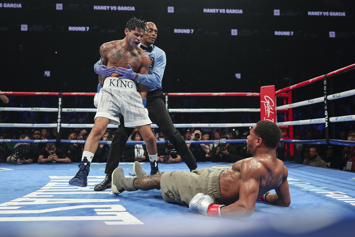 Ryan Garcia floors Devin Haney photo by Golden Boy / Cris Esqueda