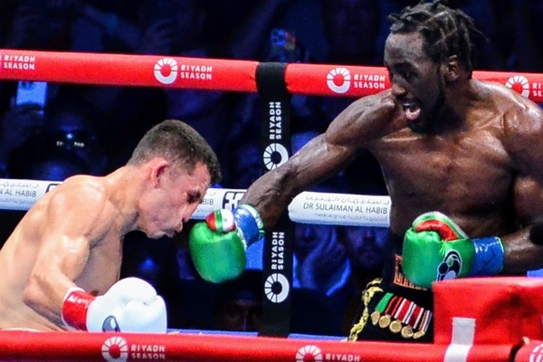 Terence Crawford edges Israil Madrimov to capture fourth world title
